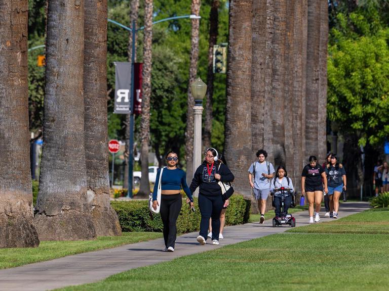 Image card - campus life students walking